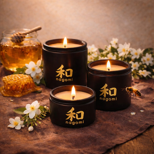 Nagomi Floral Honey Harmony candles – black glass jar trio , lit, – honey jasmine floral scent