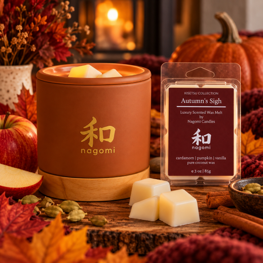 Autumn's Sigh wax melts beside a terracotta Nagomi wax warmer in a cozy autumn setting