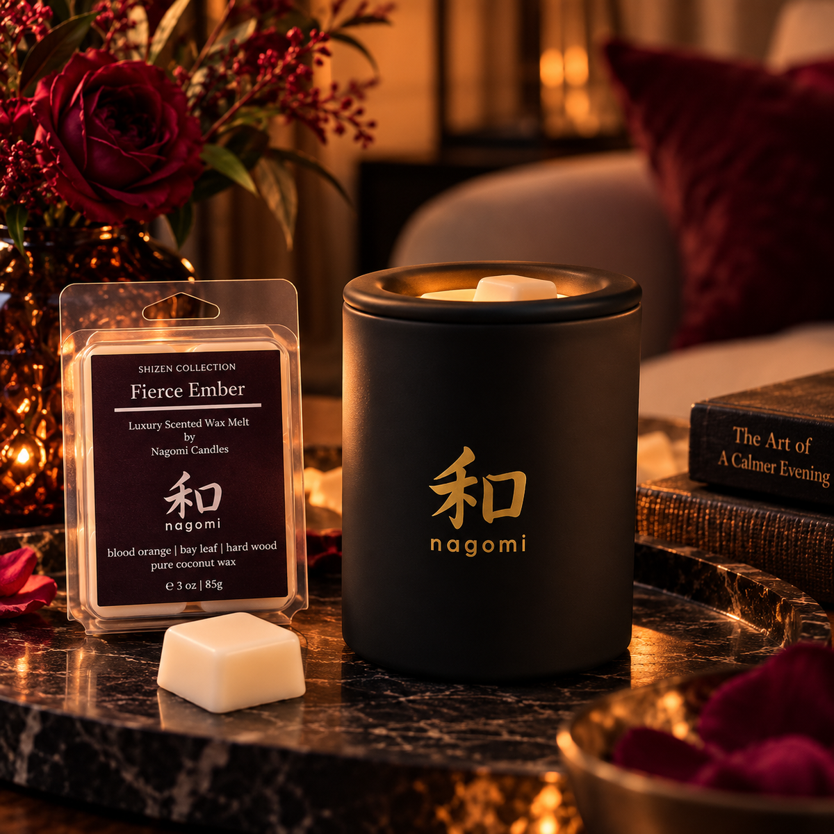 Fierce Ember wax melts beside a black Nagomi wax warmer in a warm evening setting