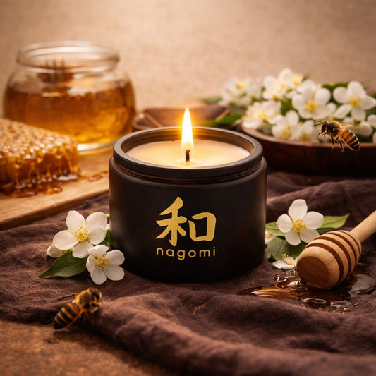 Nagomi Floral Honey Harmony candle – 4 oz black glass jar, lit,  – honey jasmine floral scent