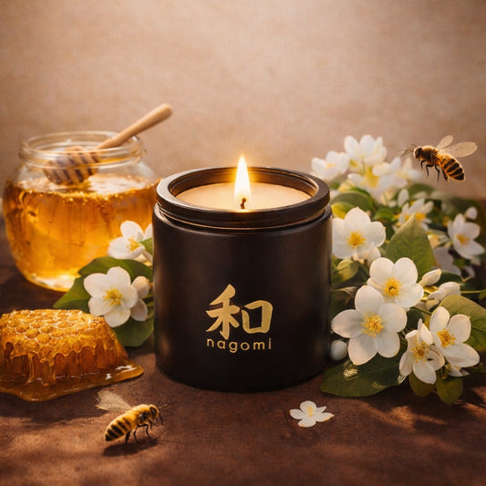 Nagomi Floral Honey Harmony candle – 8 oz black glass jar, lit,  – honey jasmine floral scent