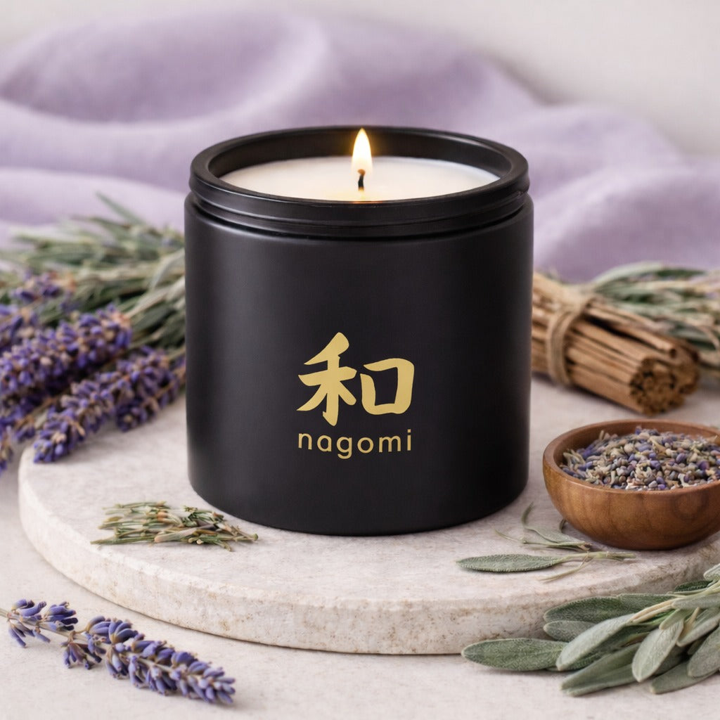 Nagomi Herbal Harmony candle – 12 oz black glass jar, lit, – lavender, sage, cedarwood 